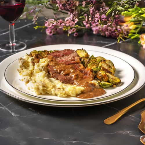 Garlic & Herb Roasted Beef with Roast Vegetables and Gravy.