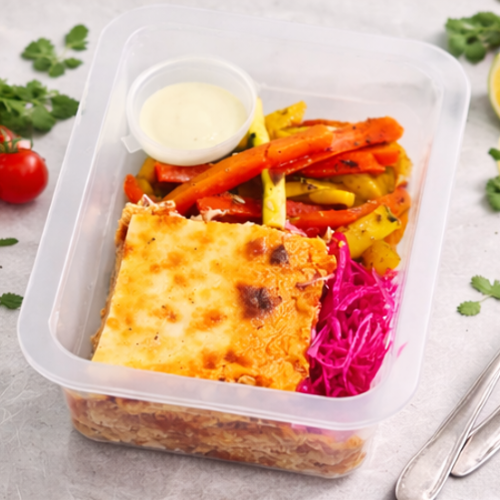 Chicken Enchilada, Pickled Red Onion and Cabbage, Charred Zucchini and Capsicum, Avocado and Sour Cream Sauce