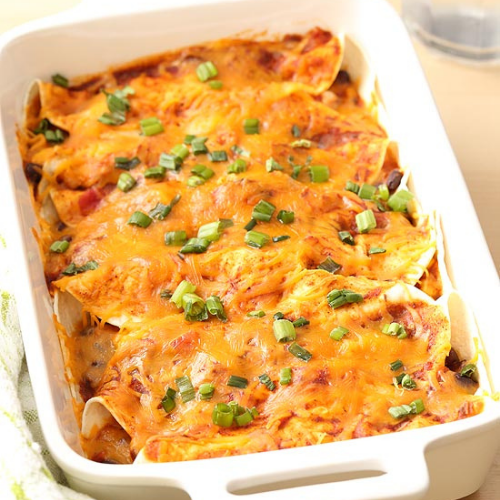 Free Range Chicken Enchiladas, Corn Kernel, Salsa and Sour Cream